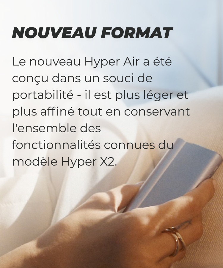 L'appareil glo Hyper Air tenu par une personne avec une description sur le design et nouveau format